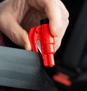Red Seatbelt Cutter with Window Breaker laser engraved with ResQMe logo